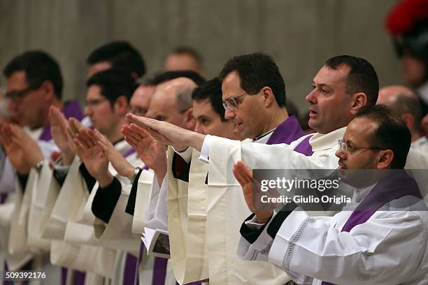 Priests attend Ash Wednesday Mass at St. Peter's Basilica on February 10, 2016 in Vatican City, Vatican. Ash Wednesday opens the liturgical 40 day...