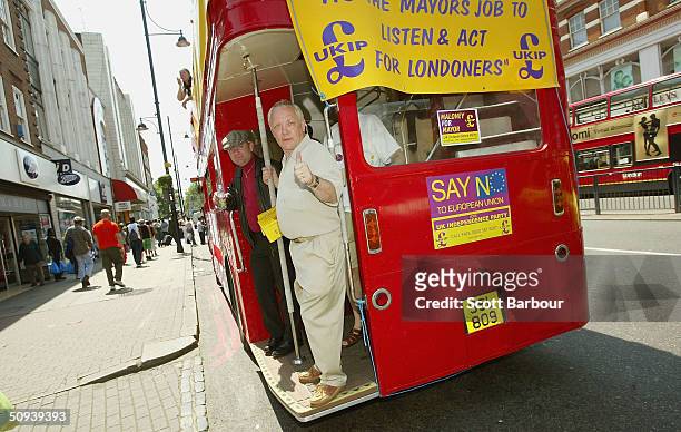 Frank Maloney, the London mayoral candidate from the UK Independence Party campaigns from a red double decker bus on June 8, 2004 in London, England....