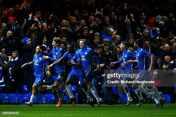 Jon Taylor of Peterborough celebrates with team-mates after scoring the opening goal during the Emirates FA Cup fourth round replay match between...