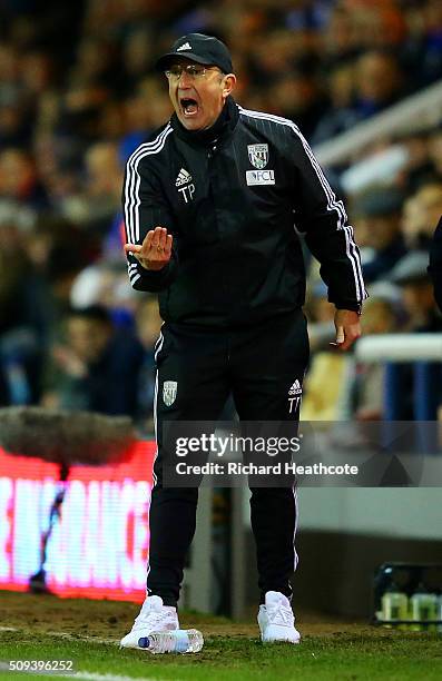Tony Pulis, manager of West Bromwich Albion issues instructions to his players during the Emirates FA Cup fourth round replay match between...