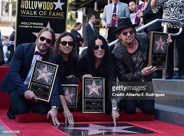 Musicians Fher Olvera, Alex Gonzalez, Sergio Vallin and Juan Calleros of the Mexican rock band Maná attend a ceremony honoring them with the 2,573rd...