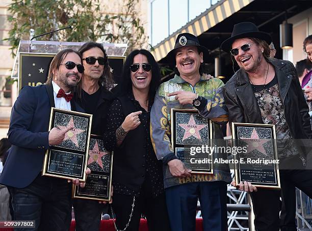 Recording artists Sergio Vallin, Juan Calleros, Alex Gonzalez, Carlos Santana and Fher Olvera attend a ceremony honoring Maná with the 2,573rd Star...