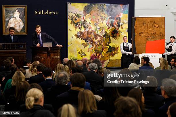 Lucien Freud's Pregnant Girl, 1960-61, Adrian Ghenie's Sunflowers in 1937 and Italian master Alberto Burri's Sacco e Rosso, c1959 are sold at the...