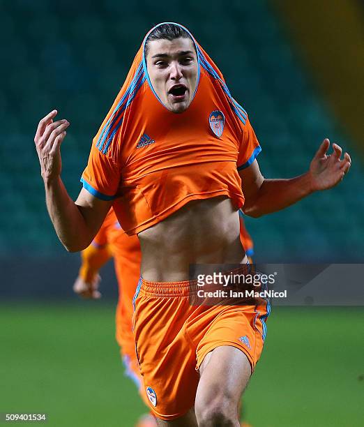 Rafael Mir of Valencia leads the celebrates as they win the penalty shoot out during the UEFA Youth Champions League match between Celtic and...