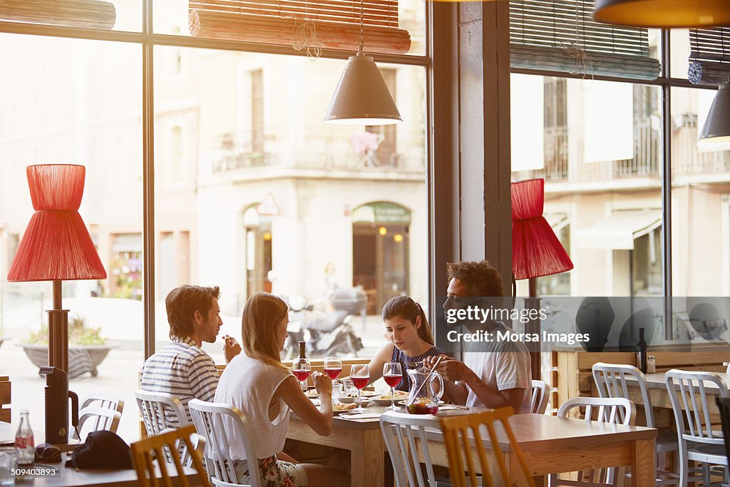 Friends having lunch in restaurant