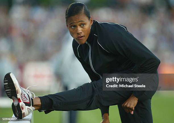 Marion Jones of United States limbers up during the IAAF Golden Spike meet in Ostrava, Czech Republic.