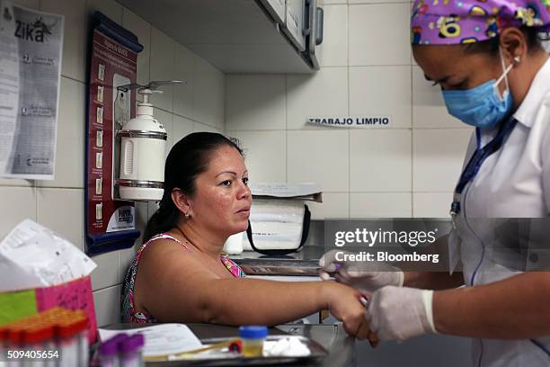 Pregnant woman, left, gets blood drawn at the Hospital Jorge Cristo Sahium in Villa Del Rosario, Colombia, on Monday, Feb. 8, 2016. Alejandro...