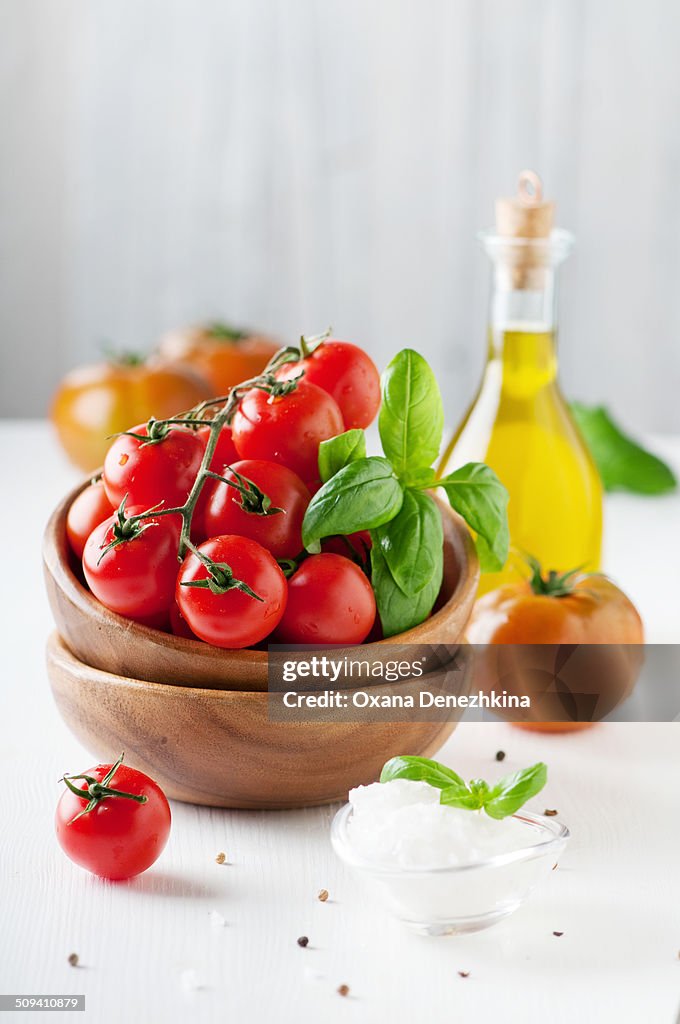Fresh tomato, green basil and italian oil
