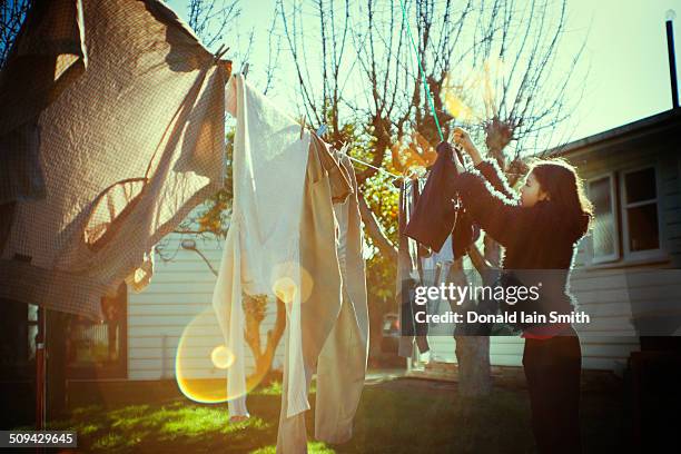 hanging out the washing - washing line stock pictures, royalty-free photos & images