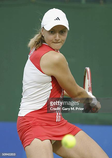 Nadia Petrova of Russia plays a backhand during her second round match against Shinobu Asagoe of Japan at the DFS Classic at Edgbaston on June 9,...