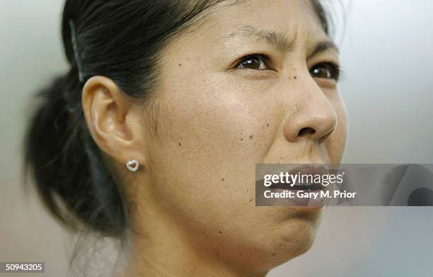 Shinobu Asagoe of Japan gathers her thoughts during her second round match against Nadia Petrova of Russia at the DFS Classic at Edgbaston on June 9,...