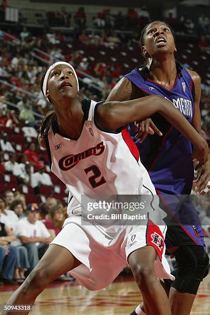 Michelle Snow of the Sacramento Monarchs and Yolanda Griffith of the Houston Comets vies for position during the game on May 30, 2004 at the Toyota...