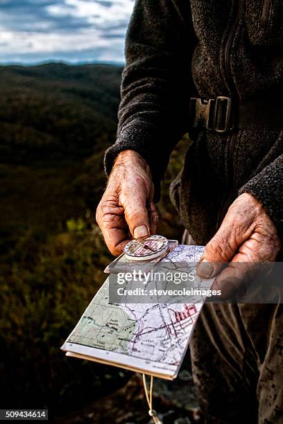 Confused Compass Photos and Premium High Res Pictures - Getty Images