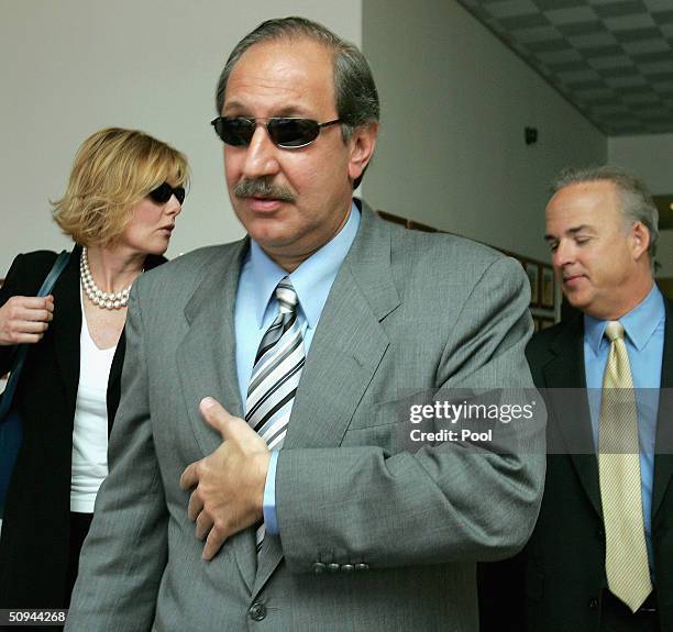 Scott Peterson's attorney Mark Geragos and his defence team leave the San Mateo County courthouse in Redwood City, California on Wednesday June 9,...