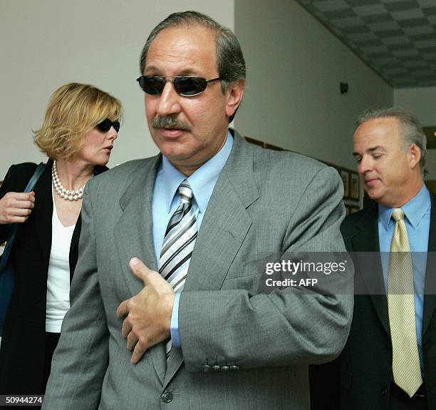 Scott Peterson's attorney Mark Geragos and his defence team leave the San Mateo County courthouse in Redwood City, California on Wednesday June 9,...