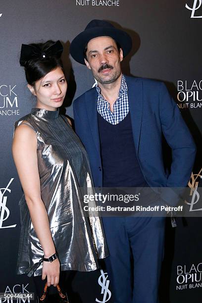 Noemi Ferst and Benjamin Moreau attend YSL Beauty launches the New Fragrance 'Black Opium Nuit Blanche' on February 10, 2016 in Paris, France.