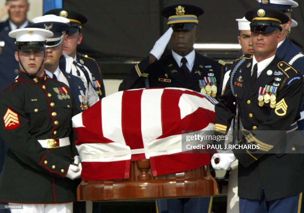 A joint US Military Honor Guard carries