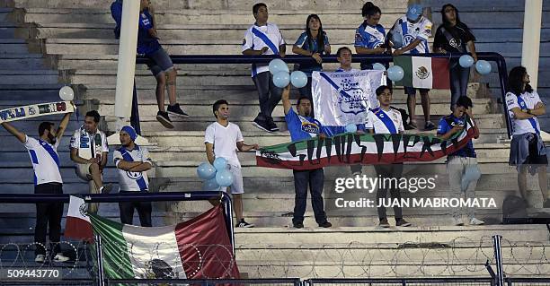 Mexico's Puebla supporters cheer for their team during the Copa Libertadores 2016 football match against Argentina's Racing Club at Juan Domingo...