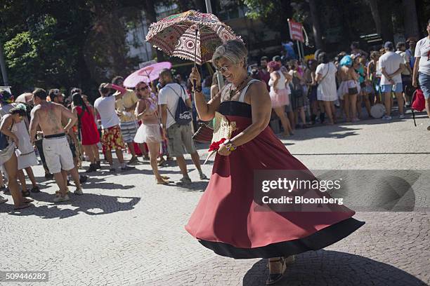 Reveler dances in the street during the Bloco das Mulheres Rodadas Carnival parade in Rio de Janeiro, Brazil, on Wednesday, Feb. 10, 2016. The Bloco...