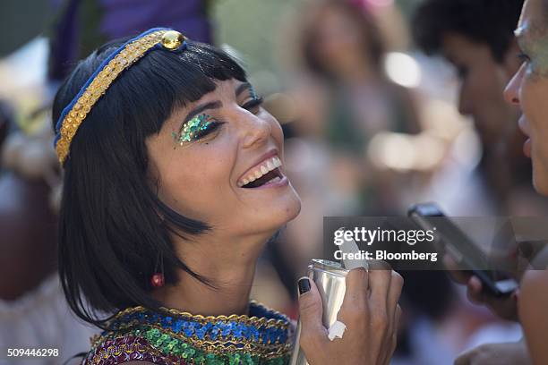Reveler dressed as Cleopatra laughs during the Bloco das Mulheres Rodadas Carnival parade in Rio de Janeiro, Brazil, on Wednesday, Feb. 10, 2016. The...