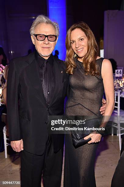 Actors Daphna Kastner and Harvey Keitel attend the 2016 amfAR New York Gala at Cipriani Wall Street on February 10, 2016 in New York City.