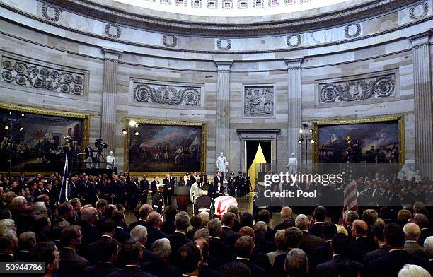 The casket of former U.S. President Ronald Reagan lies in state in the rotunda of the U.S. Capitol June 9, 2004 in Washington, DC. Reagan's body will...