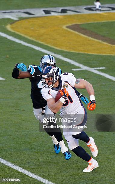 Owen Daniels of the Denver Broncos runs after making a reception during Super Bowl 50 against the Carolina Panthers at Levi Stadium on February 7,...