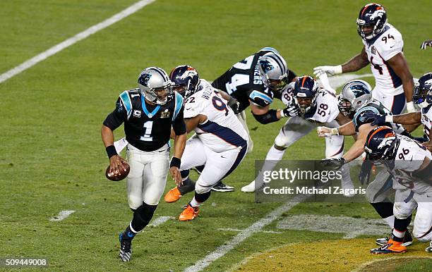 Sylvester Williams of the Denver Broncos pressures Cam Newton of the Carolina Panthers during Super Bowl 50 at Levi Stadium on February 7, 2016 in...
