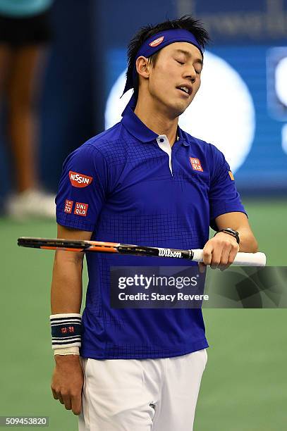 Kei Nishikori of Japan reacts to a shot during his singles match against Ryan Harrison of the United States on Day 3 of the Memphis Open at the...