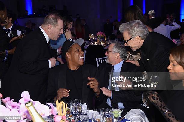 Harvey Weinstein, Jay Z, Robert De Niro, Harvey Keitel, and Grace Hightower attend the 2016 amfAR New York Gala at Cipriani Wall Street on February...