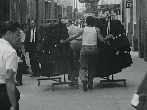 Person Pushing Garment Rack 132 Rack Of Black Dresses Stock Videos, Footage, & 4K Video Clips ...