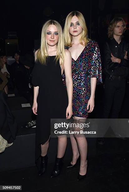 Actors Dakota Fanning and Elle Fanning, in Saint Laurent by Hedi Slimane, attend Saint Laurent at the Palladium on February 10, 2016 in Los Angeles,...