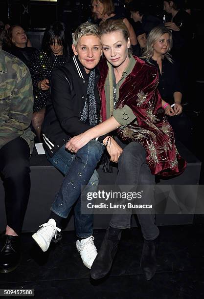 Personality Ellen DeGeneres and actress Portia de Rossi, in Saint Laurent by Hedi Slimane, attend Saint Laurent at the Palladium on February 10, 2016...