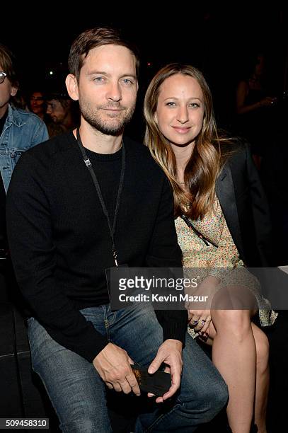 Actor Tobey Maguire and designer Jennifer Meyer, in Saint Laurent by Hedi Slimane, attend Saint Laurent at the Palladium on February 10, 2016 in Los...