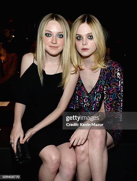 Actors Dakota Fanning and Elle Fanning, in Saint Laurent by Hedi Slimane, attend Saint Laurent at the Palladium on February 10, 2016 in Los Angeles,...