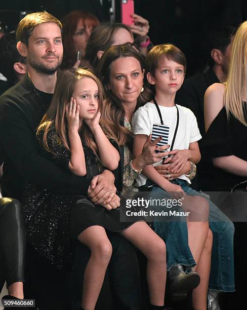 Actor Tobey Maguire, Ruby Maguire, designer Jennifer Meyer, in Saint Laurent by Hedi Slimane, and Otis Tobias Maguire attend Saint Laurent at the...
