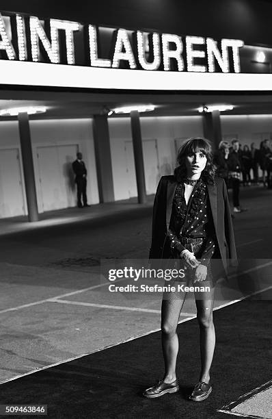 Artist Langley Fox, in Saint Laurent by Hedi Slimane attends Saint Laurent at the Palladium on February 10, 2016 in Los Angeles, California for the...