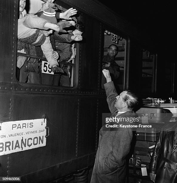 Secretary Of State Maurice Herzog At The Gare De Lyon To Meet Children Leaving For Snow Class, in Paris, France, on January 11, 1962.