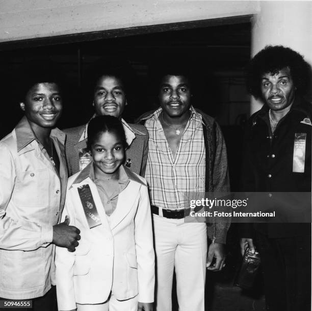 The Jacksons attend the Hollywood Santa Claus Lane Parade of Stars, Hollywood, California, November 1977. From left, Jermaine, Janet, Jackie, Tito,...