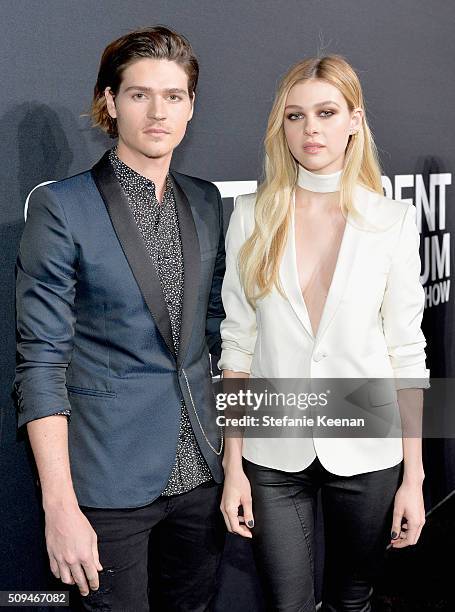 Actors Will Peltz and Nicola Peltz, both in Saint Laurent by Hedi Slimane, attend Saint Laurent at the Palladium on February 10, 2016 in Los Angeles,...