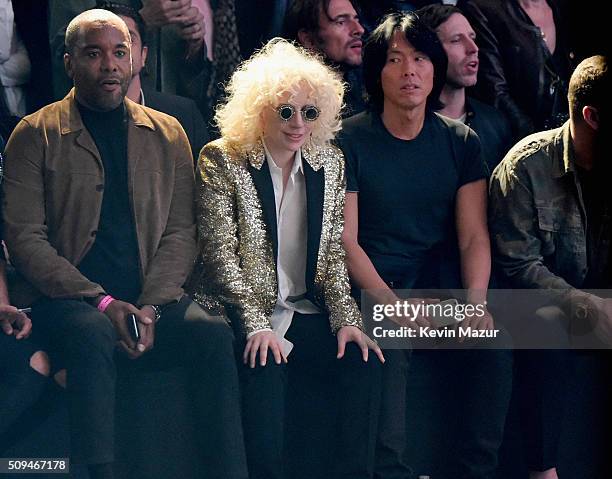 Director Lee Daniels and recording artist Lady Gaga, in Saint Laurent by Hedi Slimane, attend Saint Laurent at the Palladium on February 10, 2016 in...