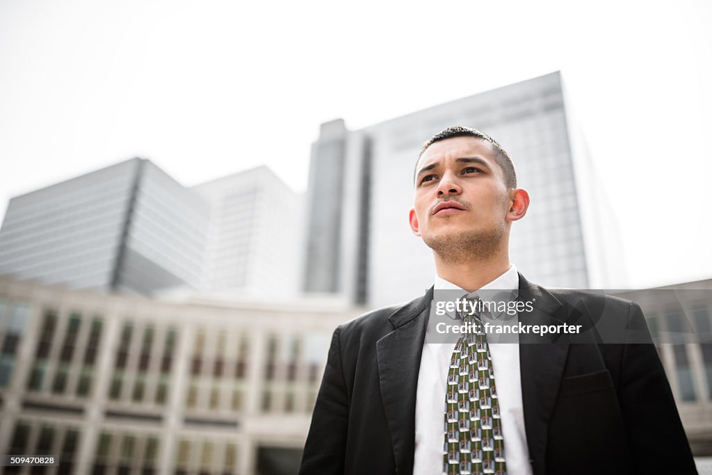 Japanese businessman standing on the city