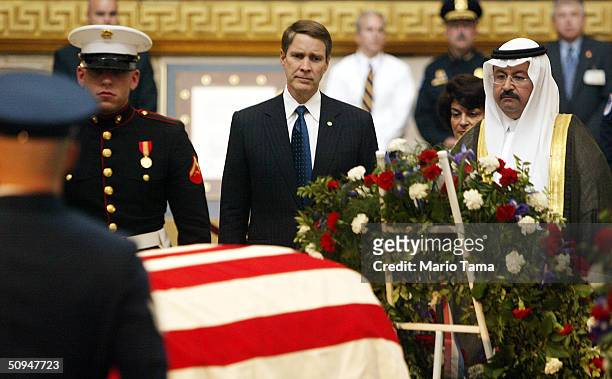 Iraq's new president Ghazi al-Yawer and U.S. Senate Majority Leader Bill Frist pay their respects at former President Ronald Reagan's casket inside...