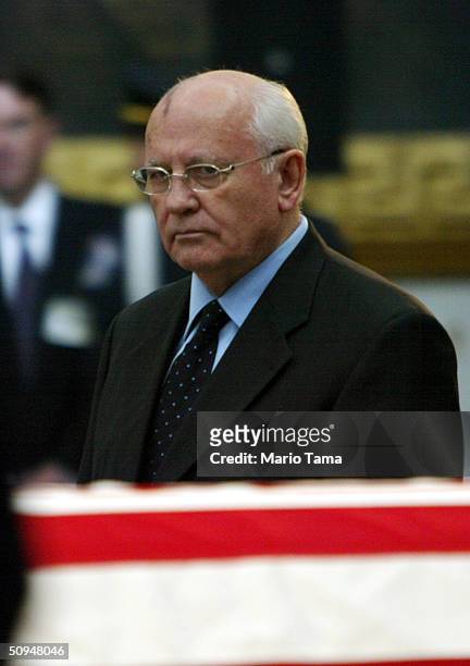 Former Soviet President Mikhail Gorbachev pays his respects at former President Ronald Reagan's casket inside the U.S. Capitol June 10, 2004 in...