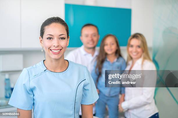 happy family at the doctors consult - pediatric dentist stock pictures, royalty-free photos & images