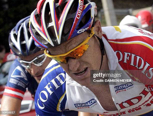 Australian Stuart O'Grady rides with US George Hincapie during the fifth stage of the "56th Criterium du Dauphine Libere", between Bollene and...