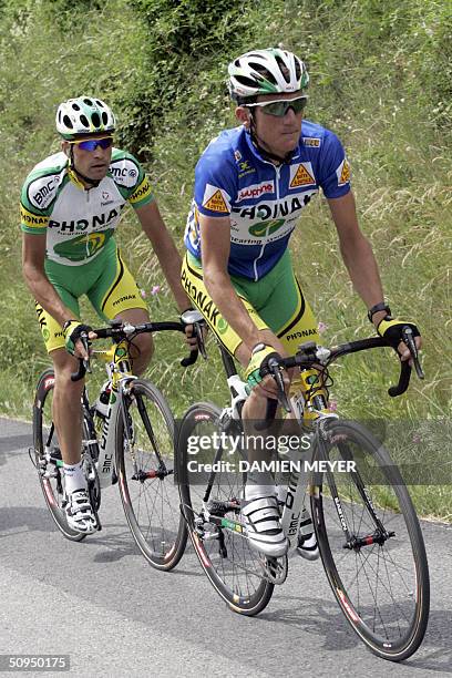 Blue jersey US Tyler Hamilton rides with teammate Spanish Oscar Pereiro during the fifth stage of the "56th Criterium du Dauphine Libere", between...