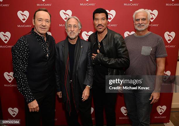 Actor Kevin Spacey, National Academy of Recording Arts and Sciences President Neil Portnow, musician Lionel Richie, and MusiCares Foundation Board...