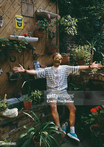 English TV presenter Timmy Mallett in the garden of his home, circa 1990.