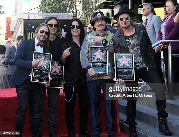 Musician Carlos Santana with Mana at the Mana Star ceremony on The Hollywood Walk of Fame held on February 10, 2016 in Hollywood, California.